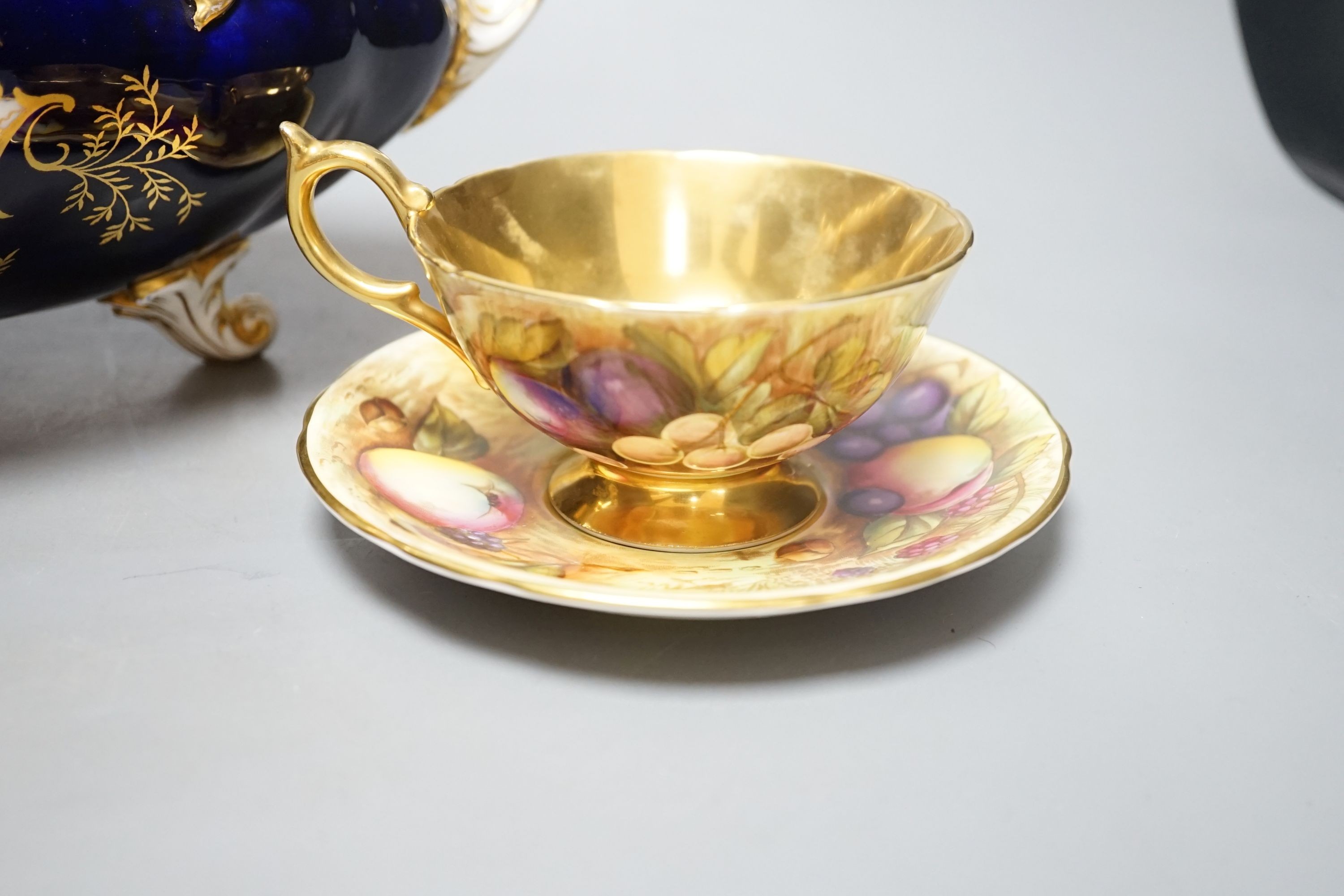 A Coalport navette shaped bowl, pattern v5146, 34cm long, and an Aynsley cup and saucer, pattern 946